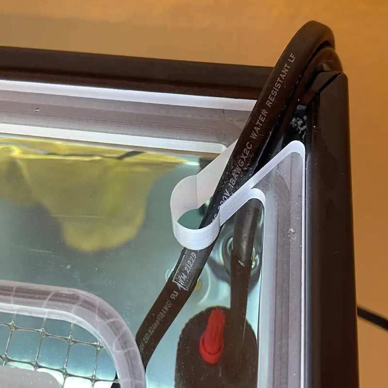 Screened aquarium lid cable cutouts for heater and filter wires