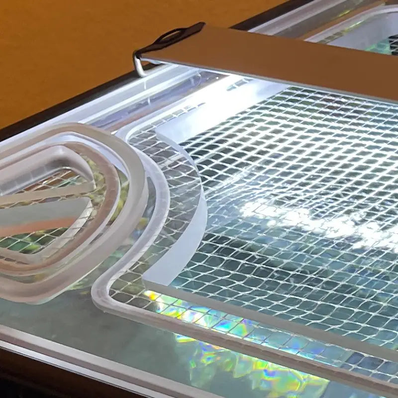 Clear polycarbonate aquarium lid material showcasing strength, durability, and warp resistance